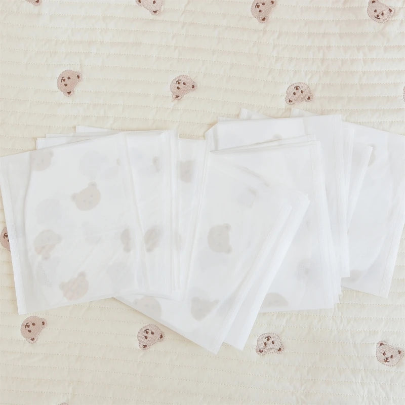 50-Pack Disposable Bibs for Babies Aged 6 Months to 2 Years Cartoon Bear Feeding Bib for Boy Girl Non-woven Drool Towel